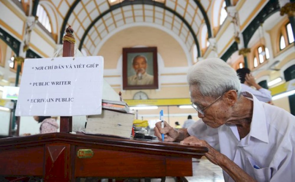 Mr. Ngo – the city's last professional public scribe, offering letter-writing services to tourists